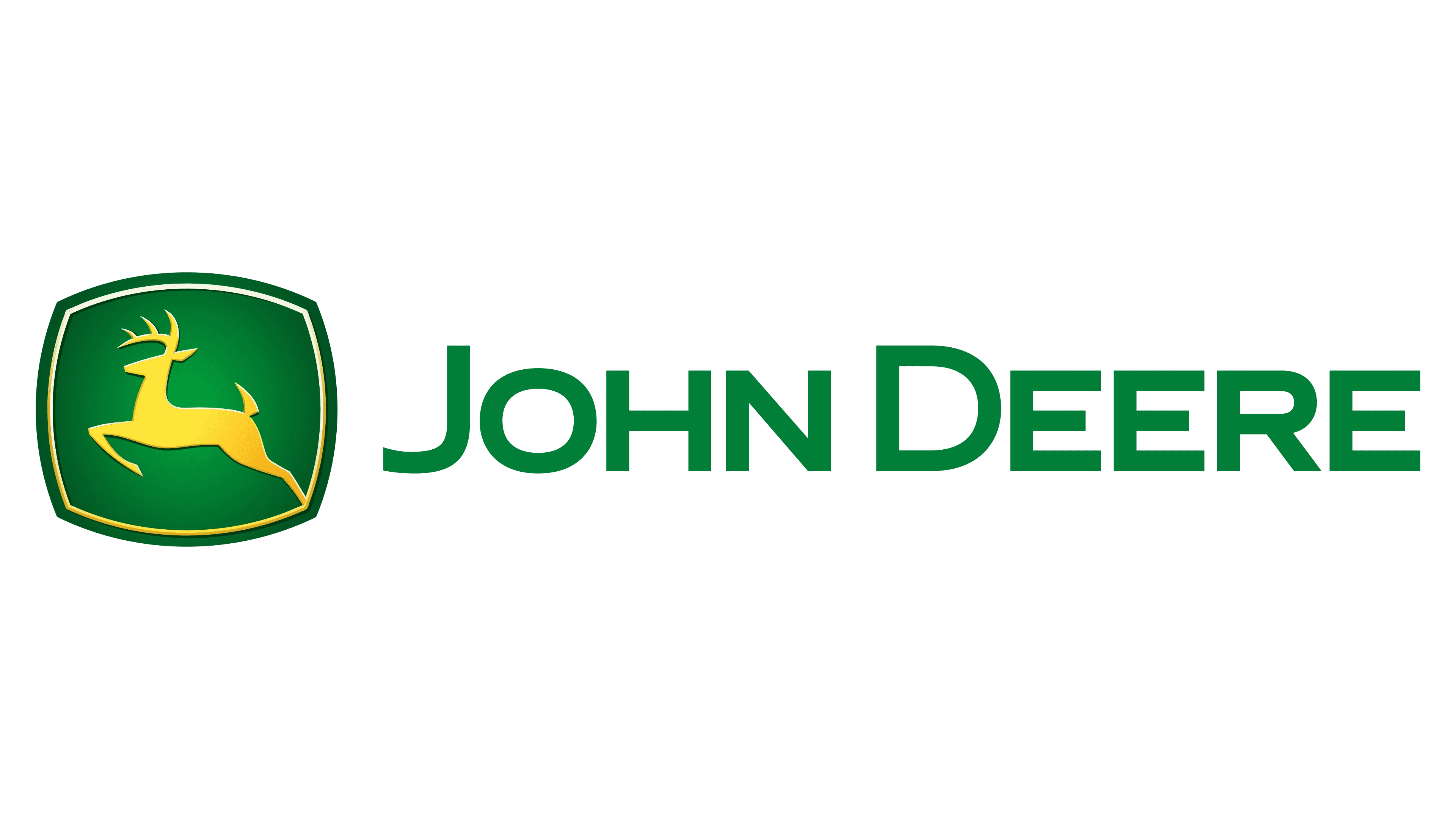 Logo von John Deere mit einem gelben springenden Hirsch in einem grünen Wappenschild links und dem Schriftzug „JOHN DEERE“ in grünen Großbuchstaben rechts daneben. | Logo of John Deere featuring a yellow leaping deer inside a green shield on the left and the text “JOHN DEERE” in green uppercase letters to the right.